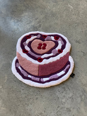Heart-shaped top of the Birthday Cake tufted rug with a bold red 22 thumbnail 3