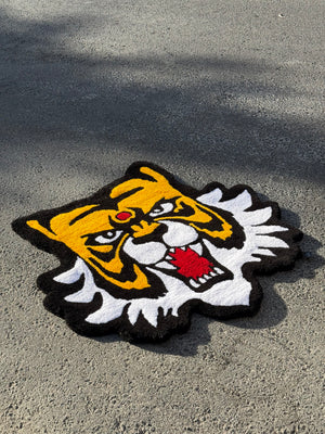 Close-up of the Masked Tiger rug's tufted pile with its red open mouth and white mane thumbnail 2